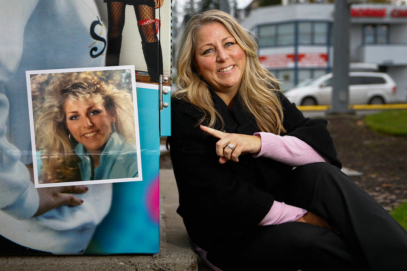 Shannon Session's high school photo decorates a signal box at Alderwood Mall.     (Kevin Clark / The Herald)