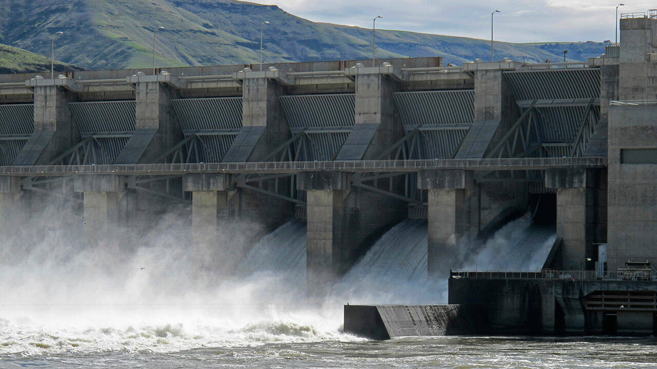 Water churns through a spillway of the Lower Granite Dam on the Snake River near Almota, Wash., in April, 2018. (Nicholas K. Geranios / Associated Press)