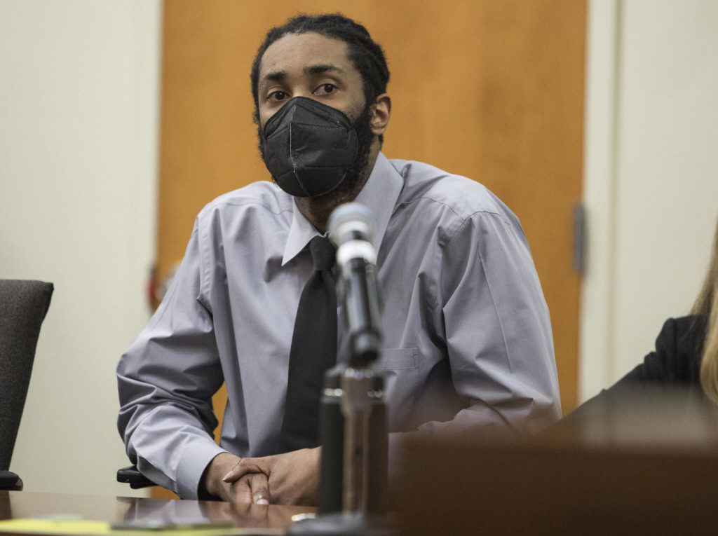 Defendant Kevin Lewis listens while Snohomish County Superior Court Judge Paul Thompson reads the guilty verdict Thursday in Everett. (Olivia Vanni / The Herald)
