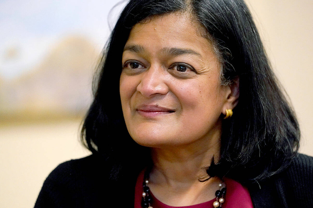 Rep. Pramila Jayapal, D-Wash., listens to a question during an interview Friday, Nov. 12, 2021, in Seattle. Jayapal's career has rapidly ascended into the top tiers of U.S. politics, bringing with her the progressive street cred she amassed in Seattle and a political sensibility she has decisively wielded in D.C. (AP Photo/Elaine Thompson)