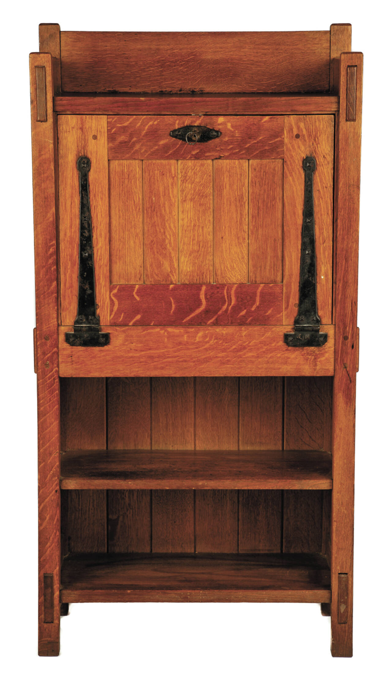 As an early example of Gustav Stickley’s work, this oak fall front desk is an Arts and Crafts design. It sold for $3,900 at Cottone Auctions. (Cowles Syndicate)