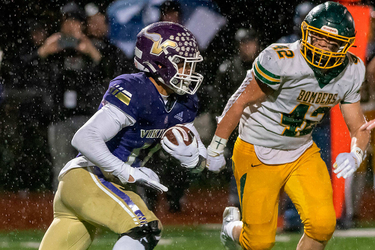 Lake Stevens running back Jayden Limar carries the ball during a 4A state playoff game against Richland on Saturday, Nov. 13, 2021 in Lake Stevens. (John Gardner / Pro Action Image)