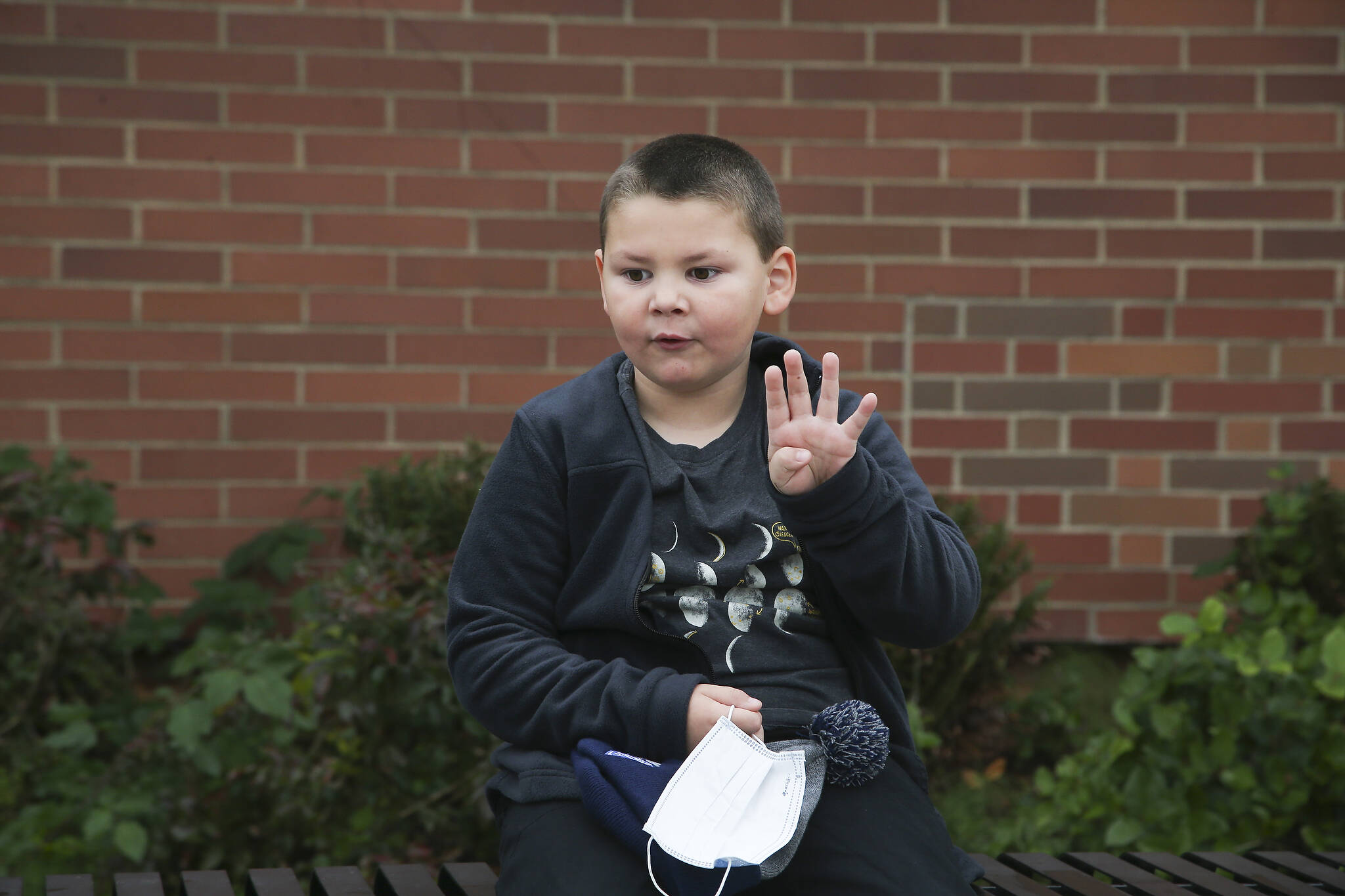 Myles, 5, answers questions about Thanksgiving outside Mt. Pilchuck Elementary on Monday in Lake Stevens. (Andy Bronson / The Herald)