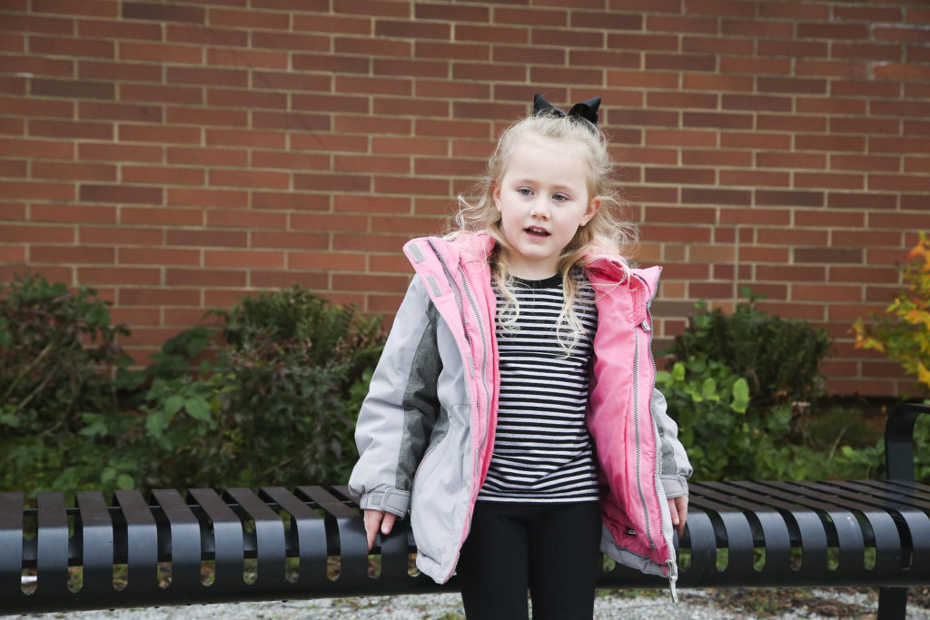 Gemma, 5, answers questions about Thanksgiving outside Mount Pilchuck Elementary on Monday in Lake Stevens. (Andy Bronson / The Herald)

