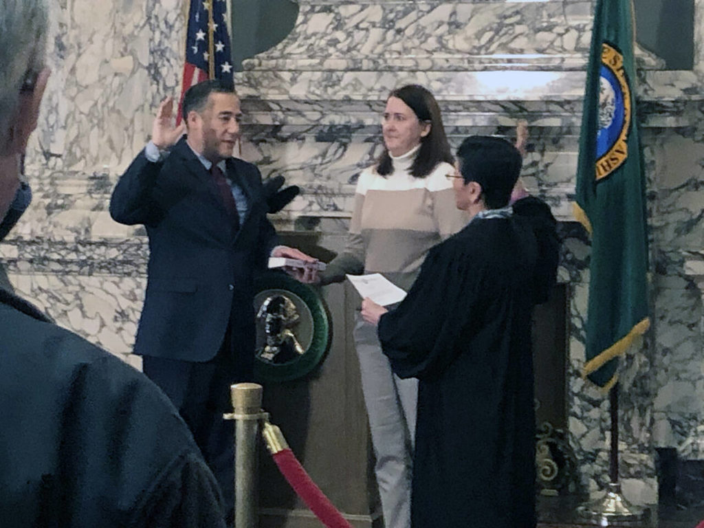Steve Hobbs, pictured with his wife, Pam, was sworn in as Washington’s secretary of state Monday by state Supreme Court Justice Mary Yu. (Washington State Democrats)
