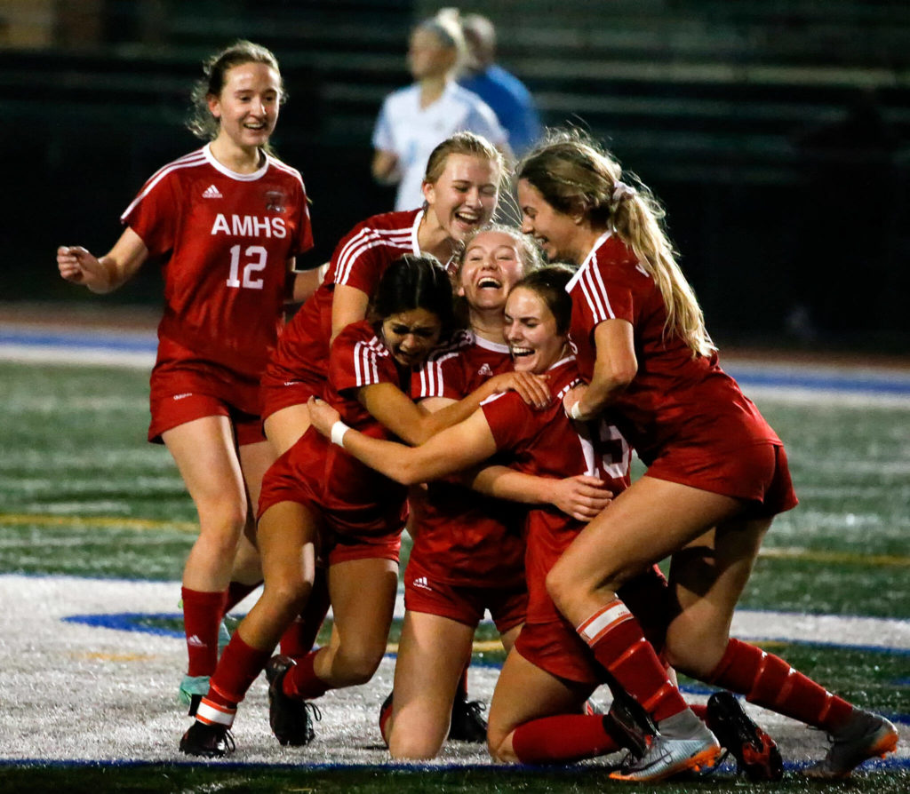 Archbishop Murphy celebrates winning the 2A state championship at Shoreline Stadium on November 20, 2021. The Wildcats won 2-0. (Kevin Clark / The Herald)
