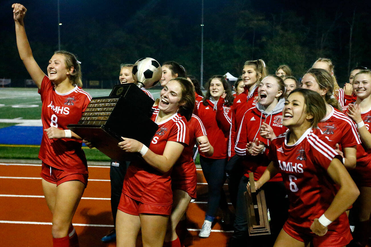 Archbishop Murphy celebrates winning the 2A state championship at Shoreline Stadium on November 20, 2021. The Wildcats won 2-0. (Kevin Clark / The Herald)