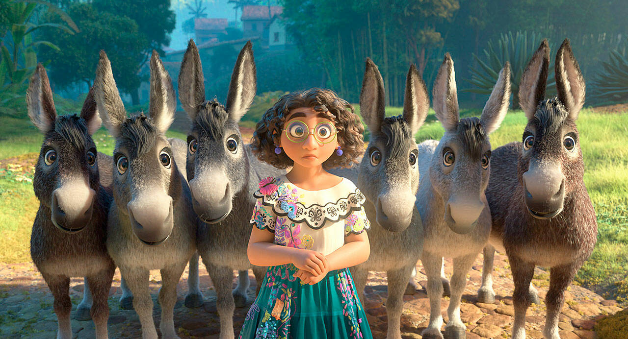 Mirabel, voiced by Stephanie Beatriz, in a scene from the animated film “Encanto.” (Disney)