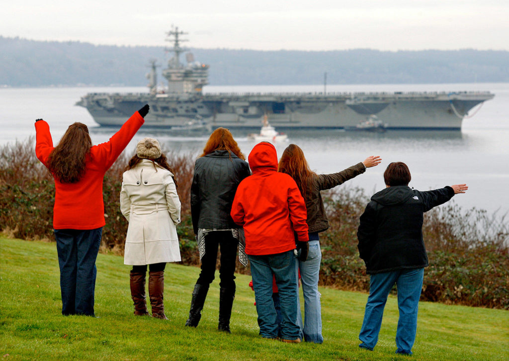 The aircraft carrier USS Nimitz returns to Naval Station Everett in time for Christmas in 2013. (Dan Bates / Herald file)
