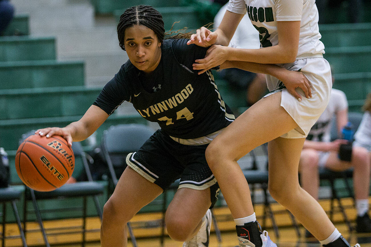 Lynnwood's Dina Yonas drives to the hoop during the game against Jackson on Tuesday, Nov. 30, 2021 in Everett, Wa. (Olivia Vanni / The Herald)