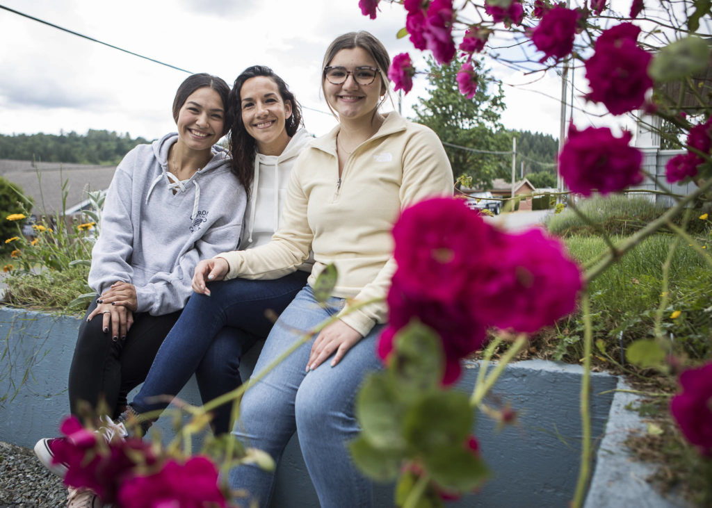 Joessie Gonzales, Jamie Gonzales and Alycia Pidgeon at their new home in Skagit County. (Olivia Vanni / The Herald)
