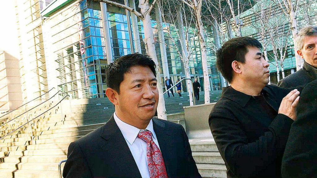 Lobsang Dargey outside the federal courthouse in Seattle in 2017. (Dan Catchpole / The Herald)
