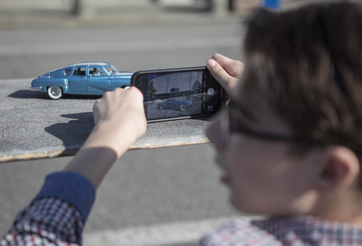 He’s 13, and famous for photos making toy cars look real