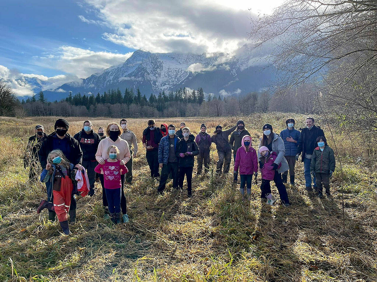 Volunteers from Boy Scout Troop 49 in Lynnwood and Girl Scout Troop 21286 in Lake Stevens helped Sound Salmon Solutions plant 357 native trees and plants along Segelson Creek and the North Fork Stillaguamish River near Darrington on Nov. 20. (Sound Salmon Solutions)