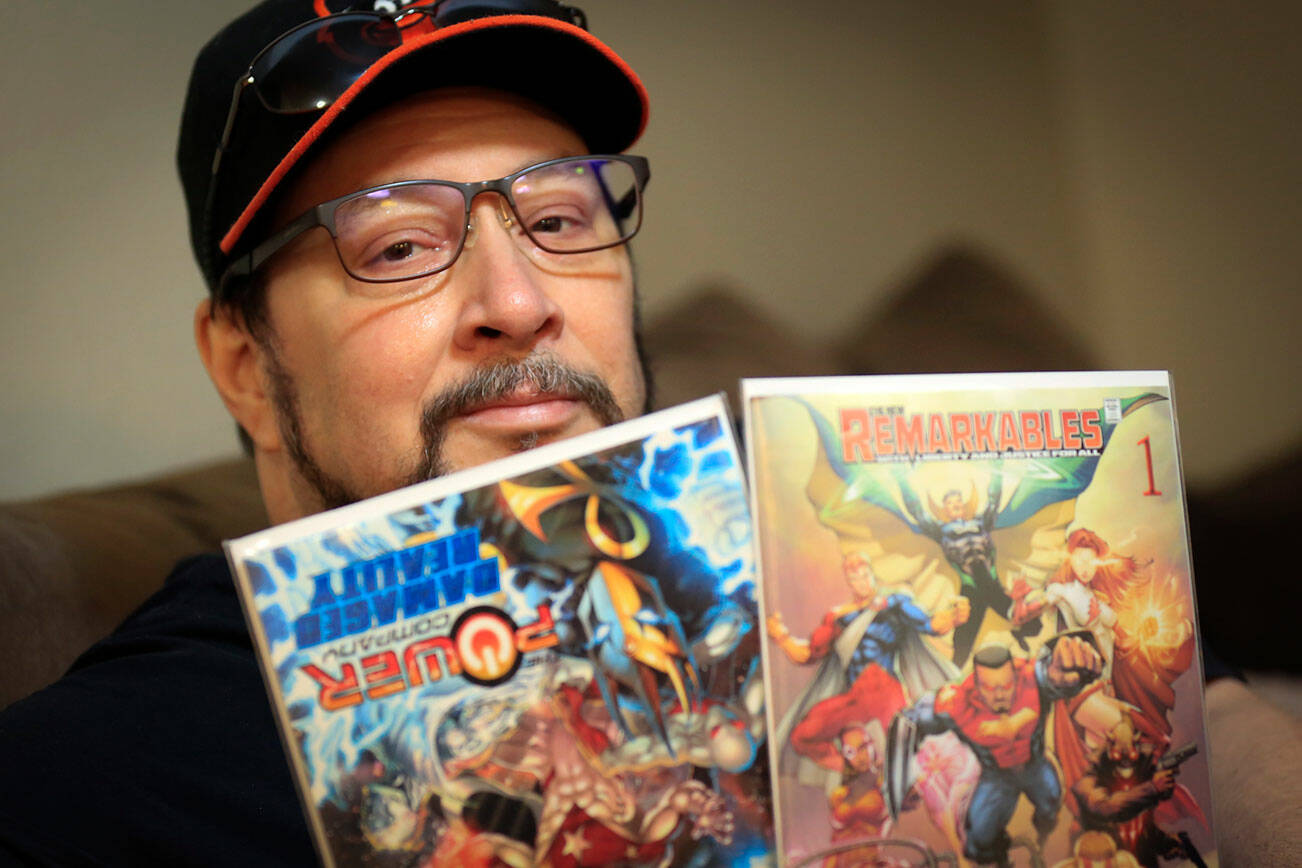 Carlos Raphael of Everett runs an indie comic studio called Champion Comics. (Kevin Clark / The Herald)