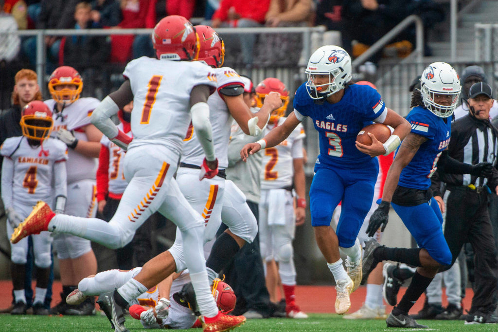 Standout dual-threat quarterback Joshua Wood and the Eagles have steamrolled opponents by 41.3 points per game. (Pete Caster / Tacoma News Tribune)
