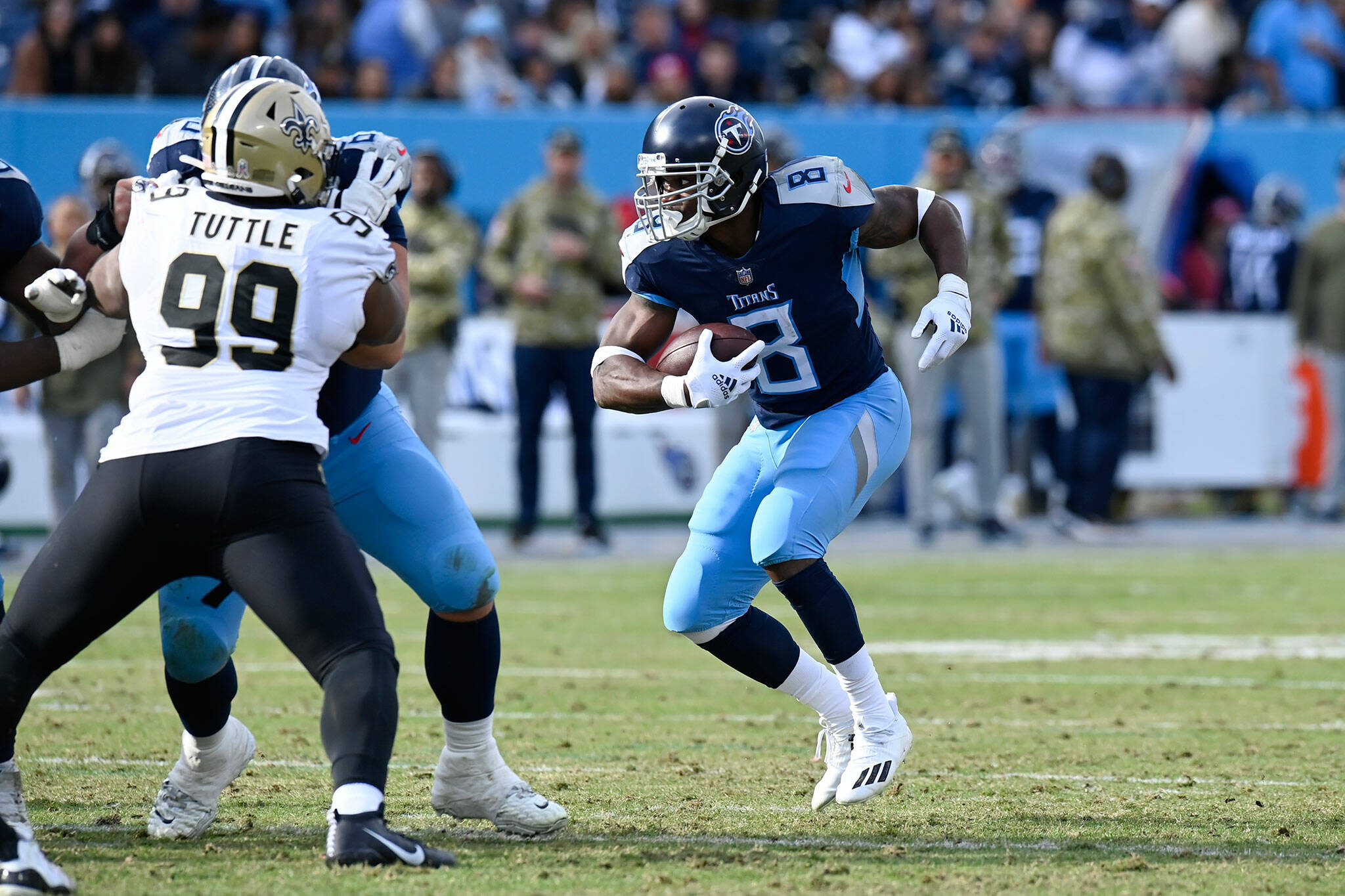 Titans running back Adrian Peterson carries the ball against the Saints during a game on Nov. 14 in Nashville, Tenn. Peterson signed with the Seahawks on Wednesday. (AP Photo/Mark Zaleski)