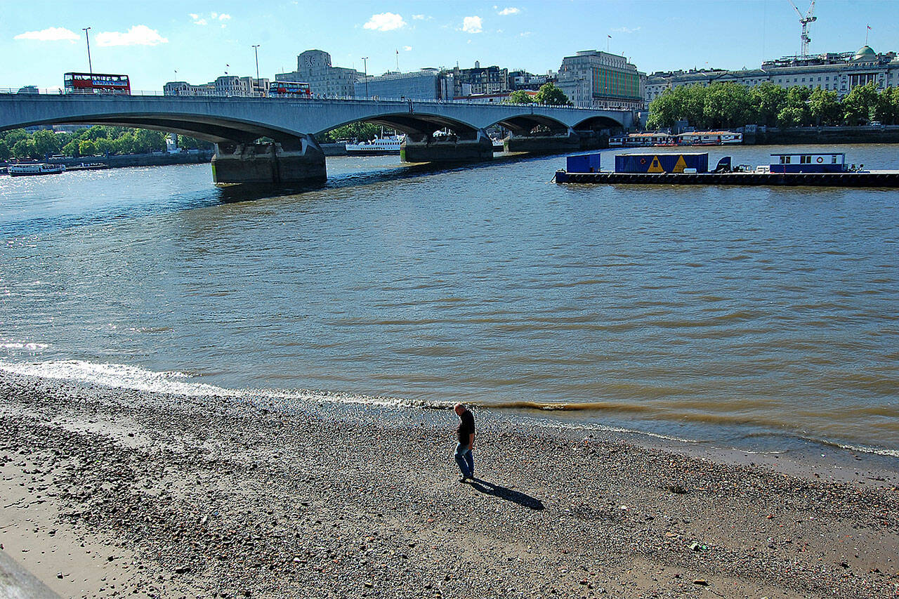 Beachcombing on the banks of the Thames at low tide in London. (Rick Steves’ Europe)