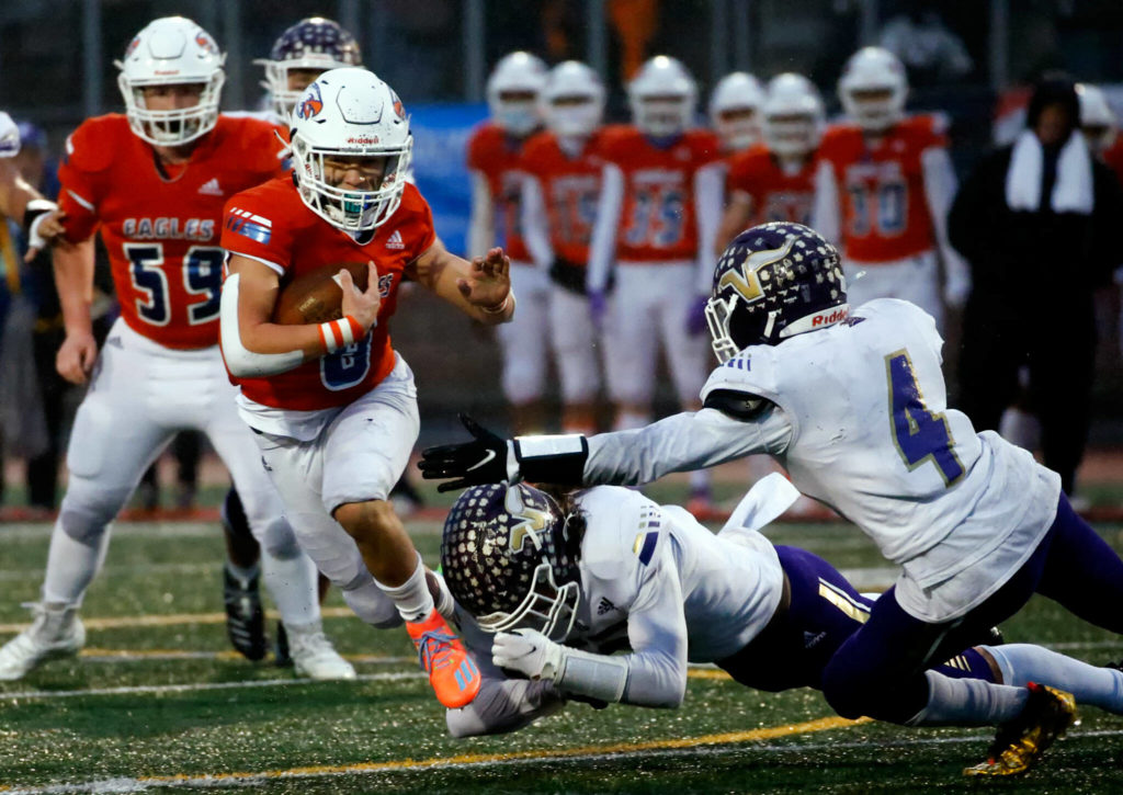 Zack Lee and the Eagles’ powerful ground attack set a 4A state championship game record with 524 yards rushing. (Kevin Clark / The Herald)
