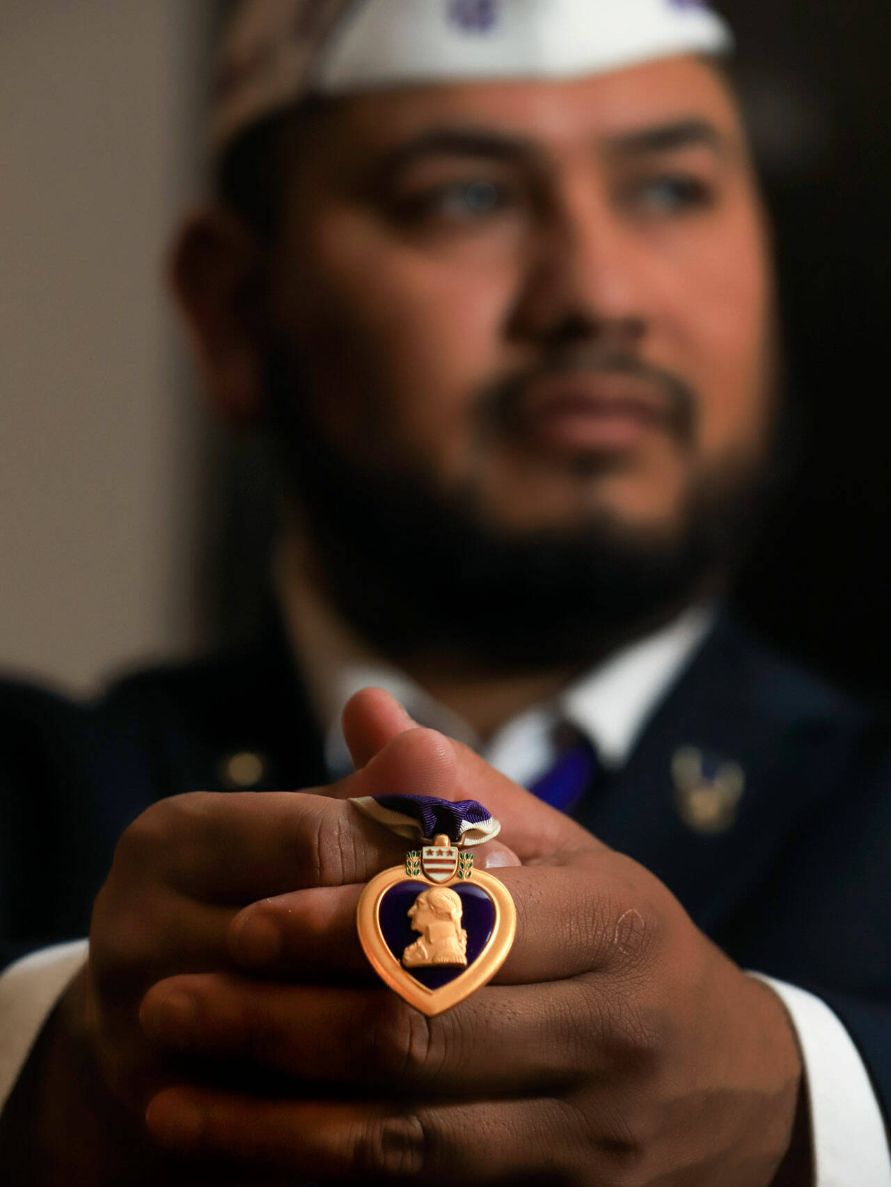 Retired Marine Robert Olivarez received his Purple Heart after five tours in Iraq and helped get Snohomish County designated a Purple Heart County. (Kevin Clark / The Herald)