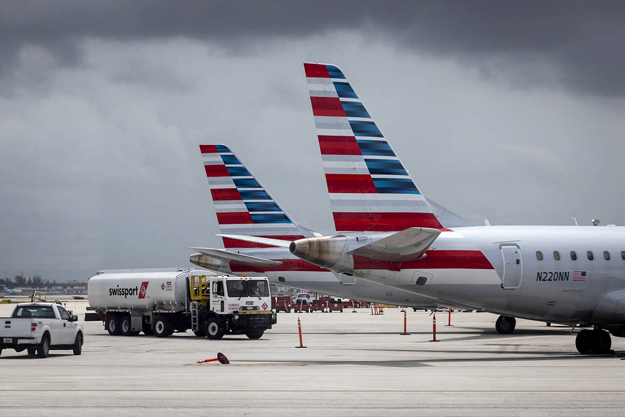 Tails fins of passenger aircraft operated by American Airlines at Miami International Airport in Miami on June 16. (Eva Marie Uzcategui/Bloomberg)