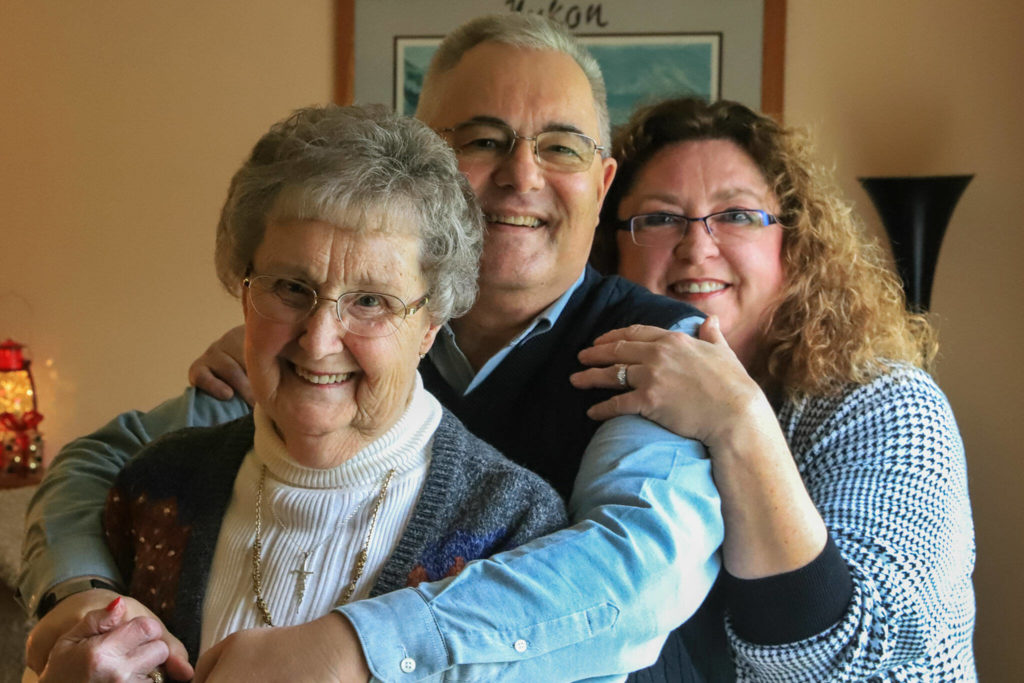 Shirley Howard (front) with her newfound son, Laird Will, and daughter Glenna Atkins. Laird Will found his biological mom and sister through a home DNA test. (Kevin Clark / The Herald)
