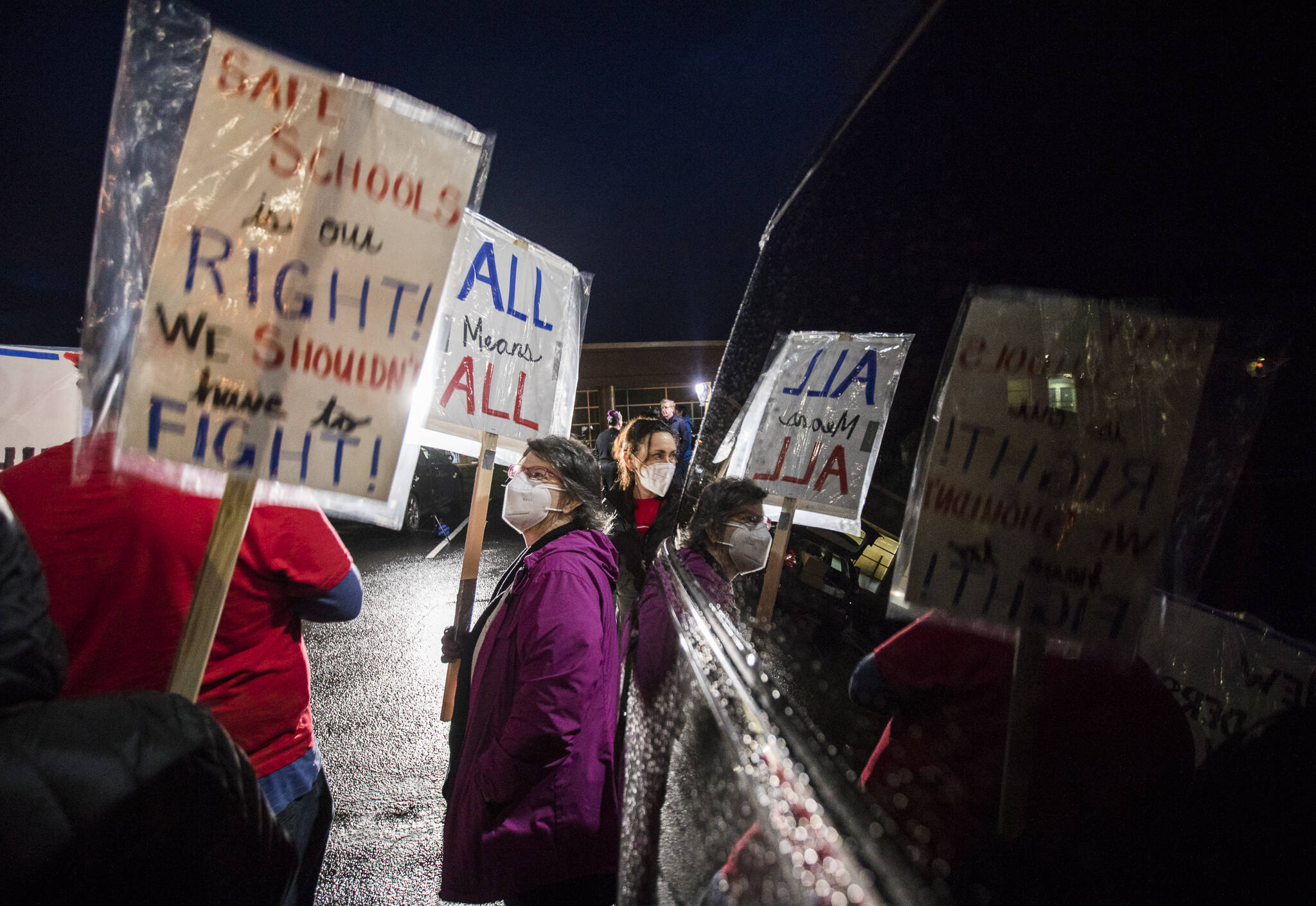 People gather Monday for a rally demanding that the Monroe School District address harassment and bullying. (Olivia Vanni / The Herald)