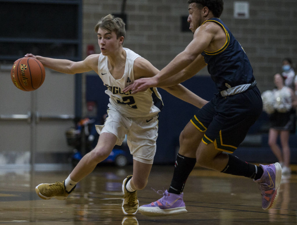 Arlington freshman Leyton Martin came off the bench and scored 14 points in the second half and overtime. (Olivia Vanni / The Herald)
