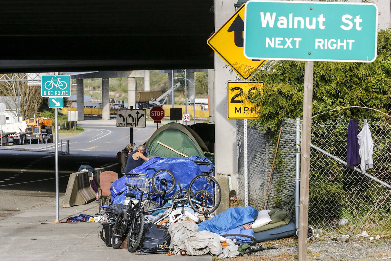 Homeless campers in Everett. The Snohomish County Council has adopted a controversial 0.1% sales tax that will fund emergency and affordable housing as well as behavioral health services. (Kevin Clark / Herald file)