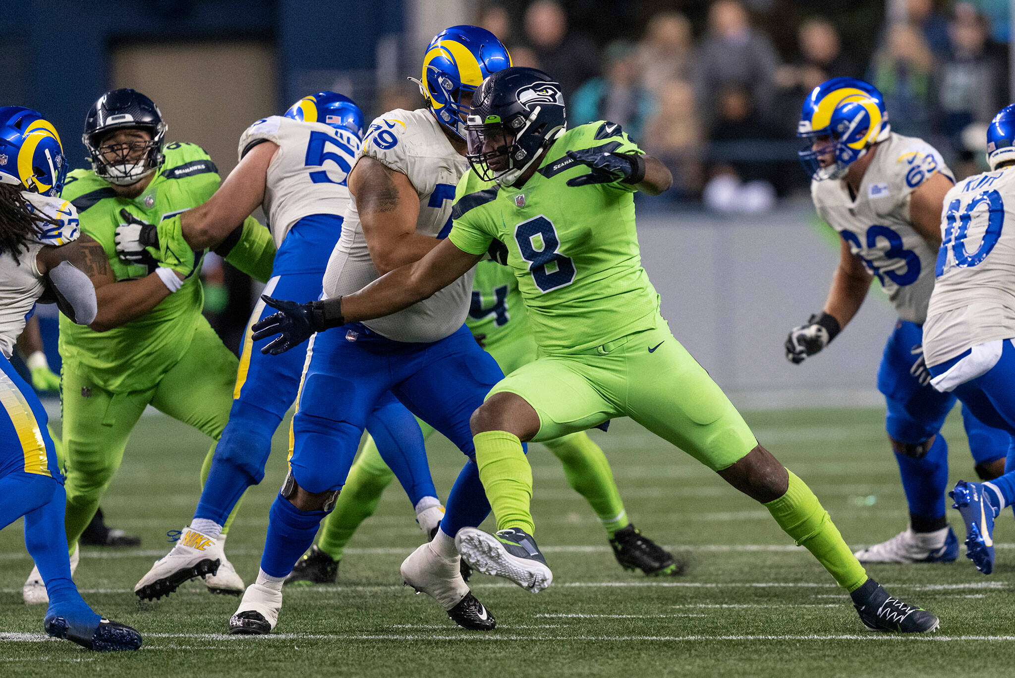Seahawks defensive end Carlos Dunlap rushed the quarterback during the second half of a game against the Rams on Oct. 7, 2021, in Seattle. (AP Photo/Stephen Brashear)