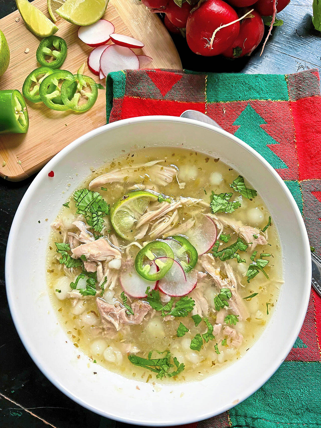 Hot and nourishing, this easy chicken pozole is made with jarred salsa verde. (Gretchen McKay / Pittsburgh Post-Gazette)