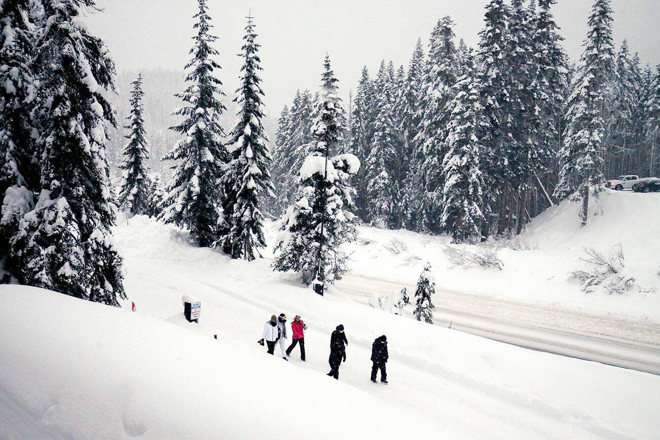 Heavy snow welcomes people to the slopes and scenery of Stevens Pass Wednesday afternoon on December 22, 2021.  (Kevin Clark / The Herald)