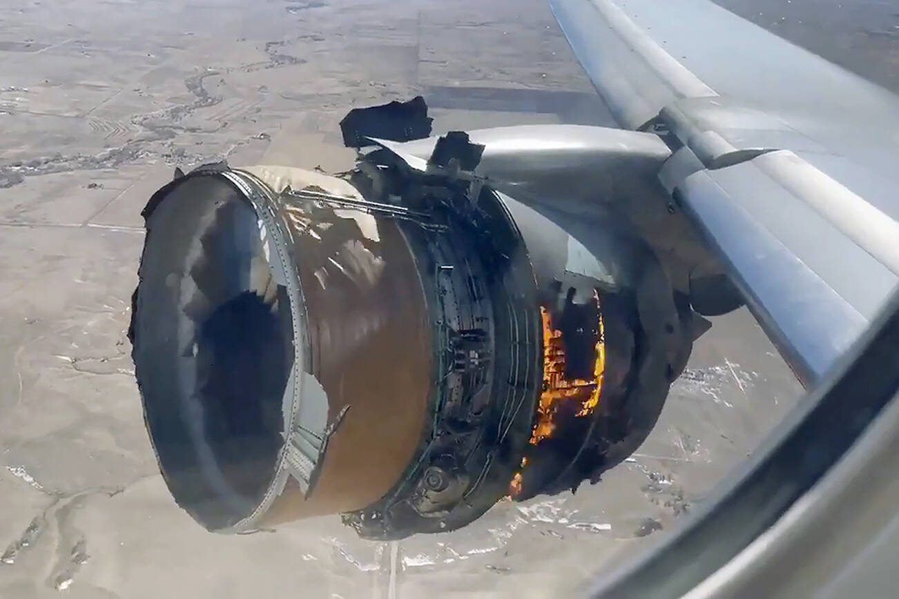 In this image taken from video, the engine of United Airlines Flight 328 is on fire after after experiencing "a right-engine failure" shortly after takeoff from Denver International Airport, Saturday, Feb. 20, 2021, in Denver, Colo. The Boeing 777 landed safely and none of the passengers or crew onboard were hurt. (Chad Schnell via AP)