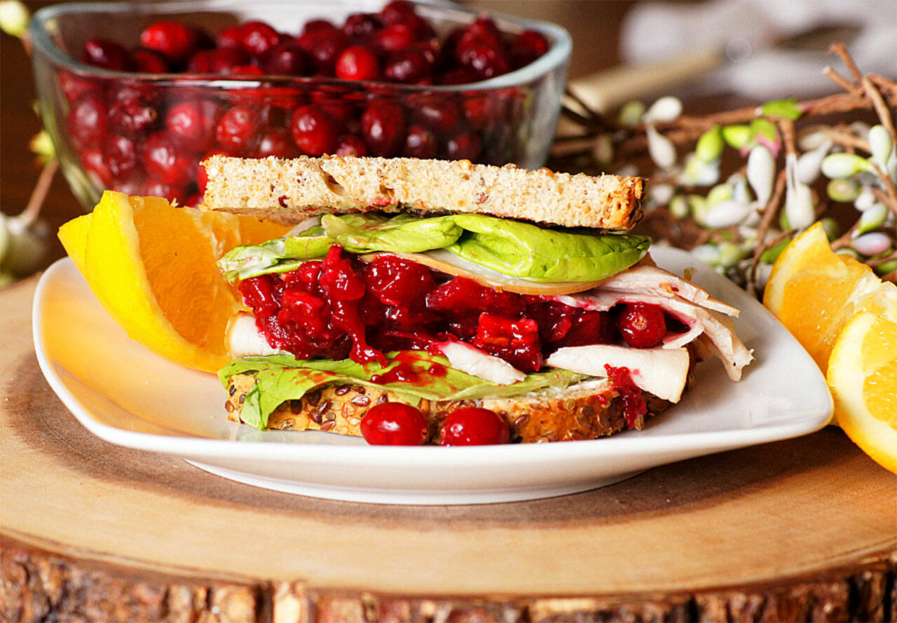 Holiday feasts make delicious leftover meals, like this turkey and cranberry sandwich.