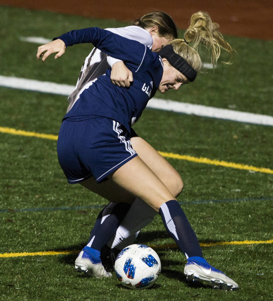 Glacier Peak’s Chloe Seelhoff fights for the ball during a game against Jackson on Oct. 26, 2021 in Snohomish. (Olivia Vanni / The Herald)
