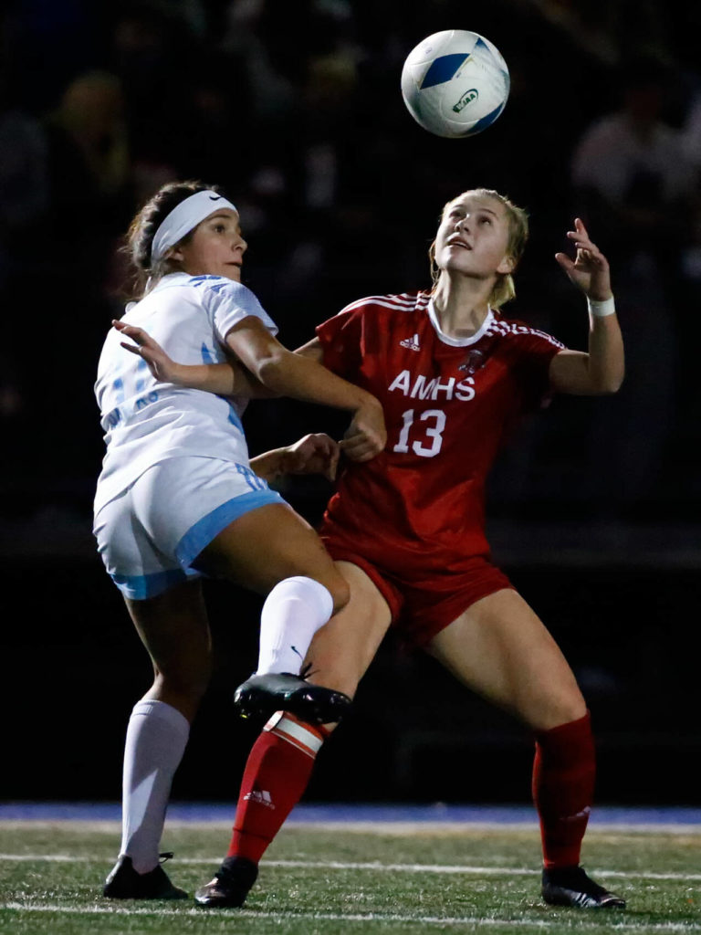 Archbishop Murphy’s Reeve Borseth vies for control of the ball during the 2A state championship against Hockinson at Shoreline Stadium on Nov. 20, 2021. (Kevin Clark / The Herald)
