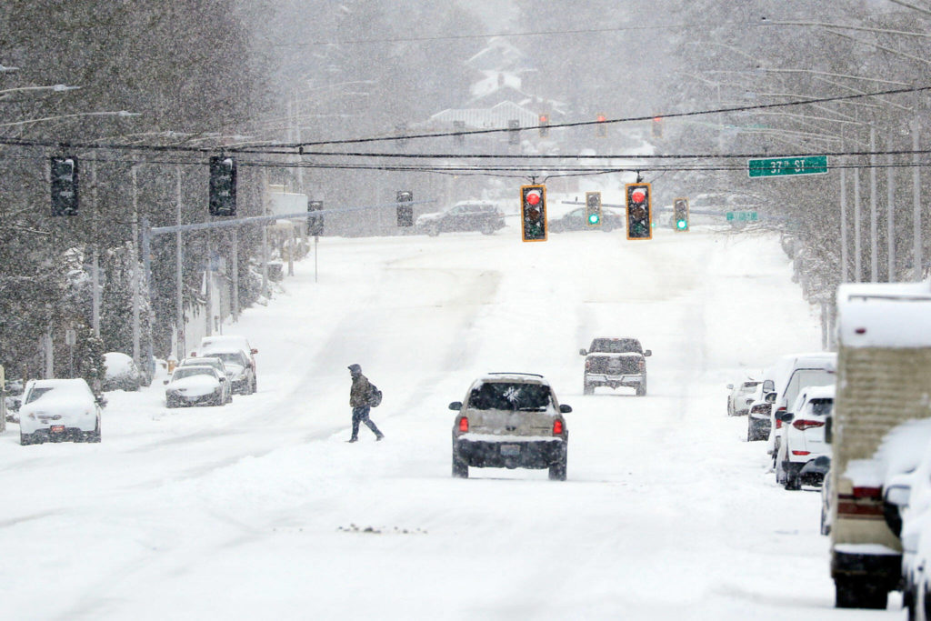 Wind and snow has traffic to a minimum Sunday afternoon in Everett. (Kevin Clark / The Herald)
