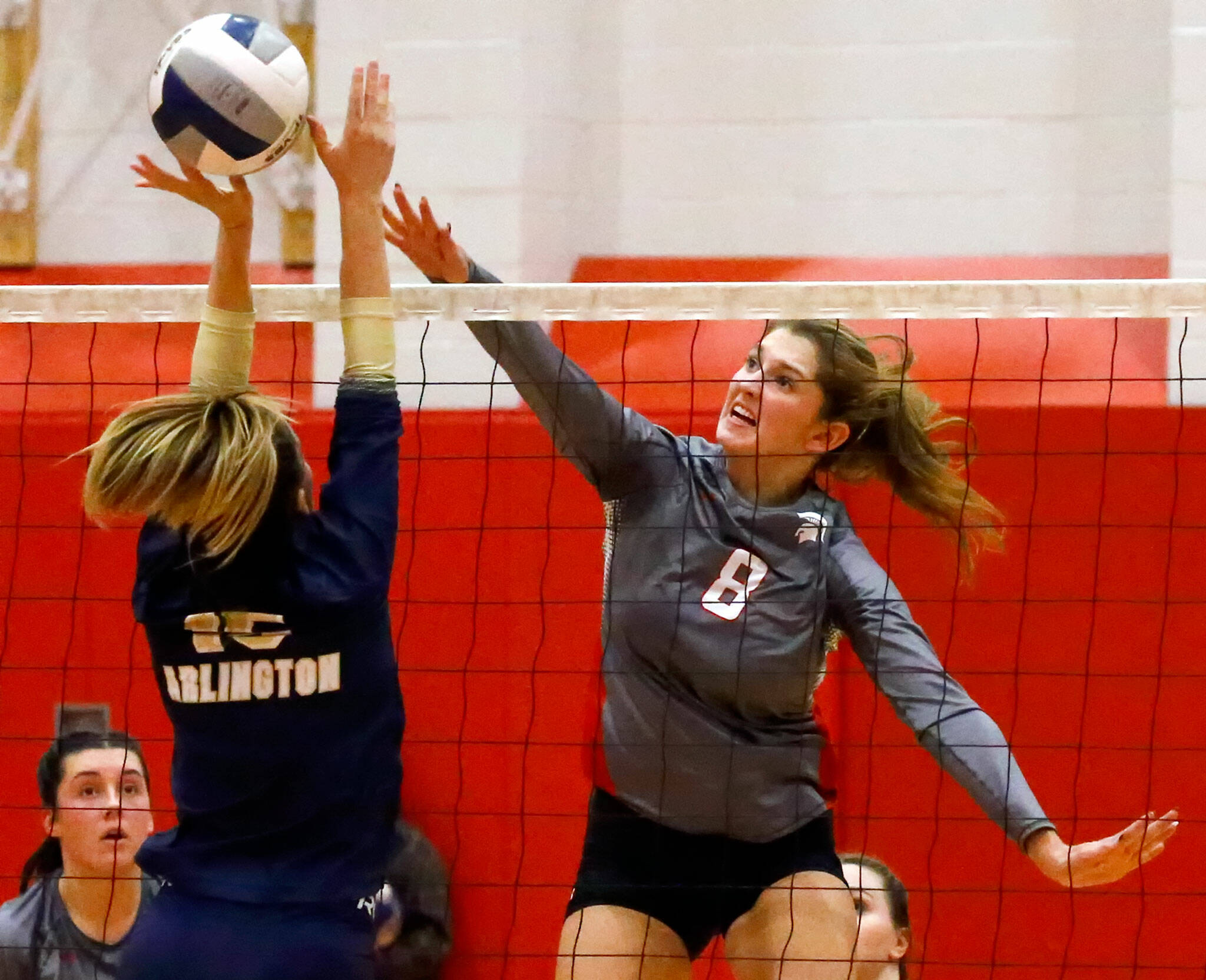 Stanwood’s Olivia Rueckert (8) averaged 2.3 kills, 0.8 blocks and 0.6 digs per set while helping Stanwood reach the Class 3A state tournament. (Kevin Clark / The Herald)