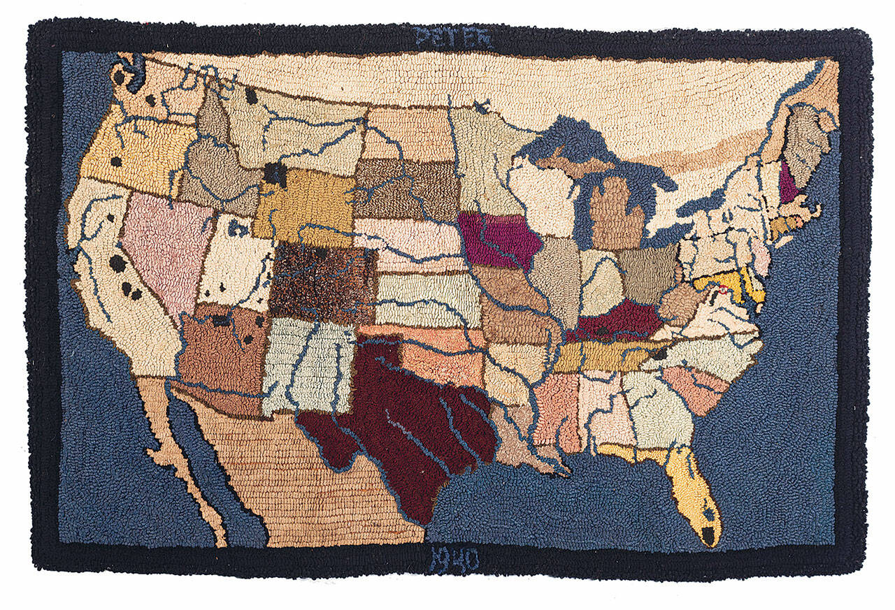 This hooked rug with a picture of the continental United States has the name of the recipient and the date on the back. It brought $469 at Cowan’s Auctions. (Cowles Syndicate Inc.)