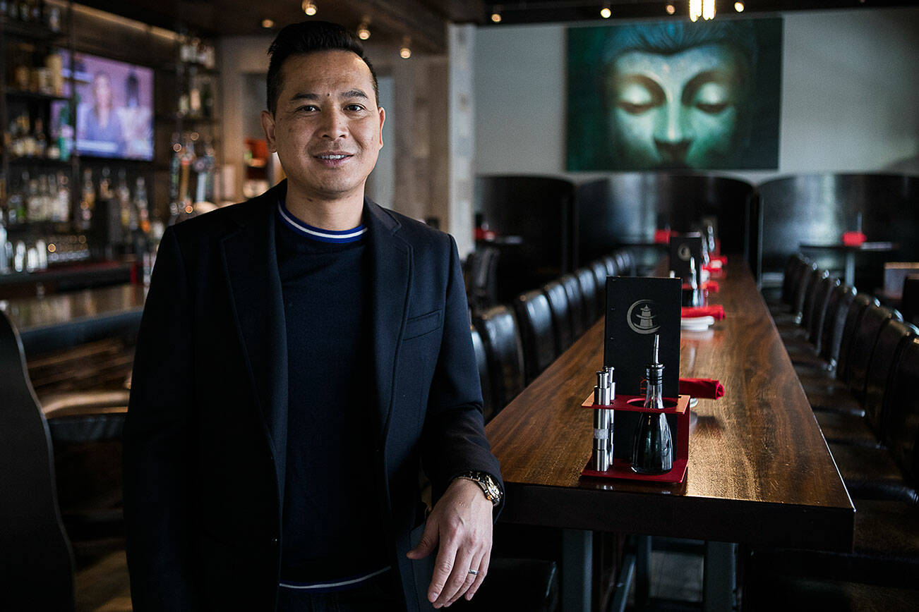 Jack Ng, owner of China City, at his restaurant in Mill Creek on Tuesday, Jan. 4, 2022. (Olivia Vanni / The Herald)