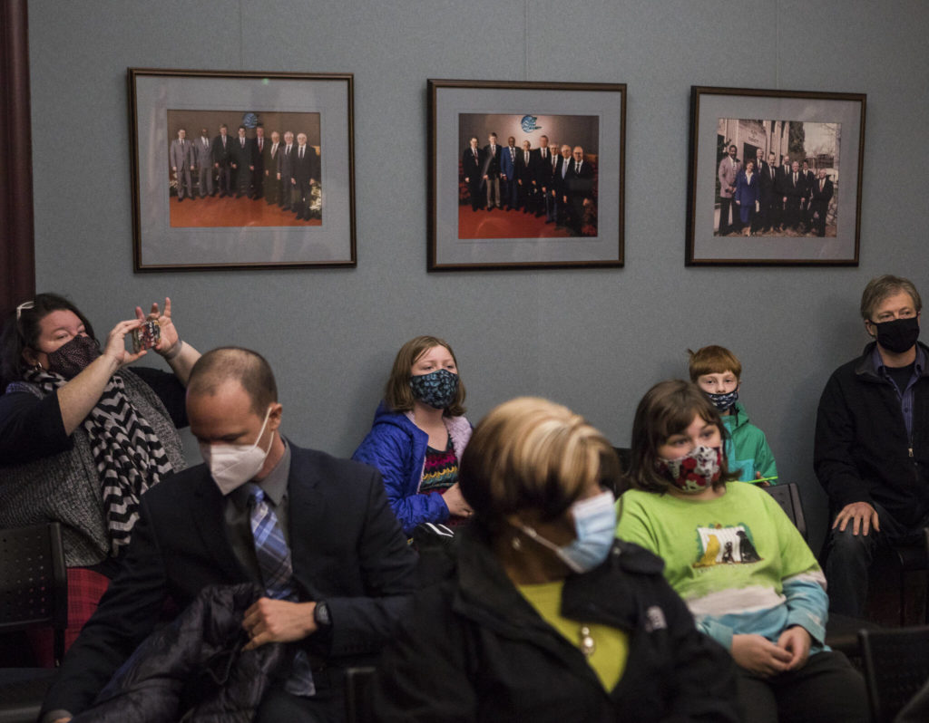 Family and friends of elected officials watch as City Council members are sworn in Monday in Everett. (Olivia Vanni / The Herald)
