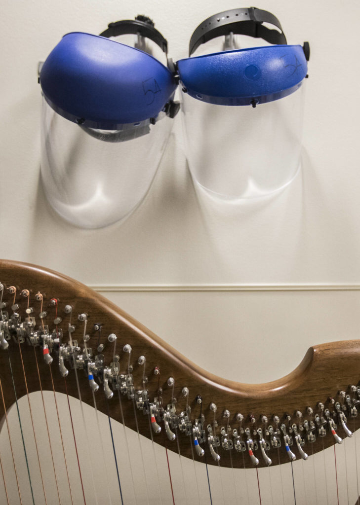 April Mitchell’s harp sits in the corridor outside of a patient’s room at Providence Regional Medical Center Everett on Dec. 17, 2021. (Olivia Vanni / The Herald)
