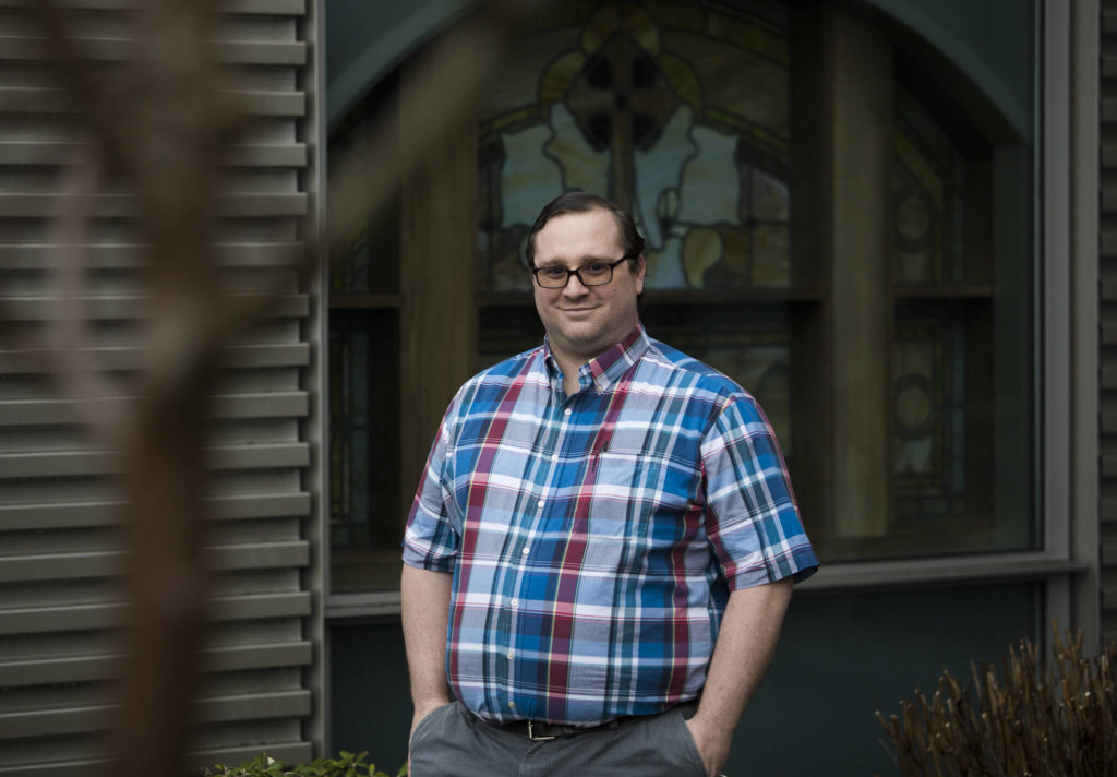 Josh Wilson, chaplin at Providence Regional Medical Center Everett, stands outside of the chapel. (Olivia Vanni / The Herald)
