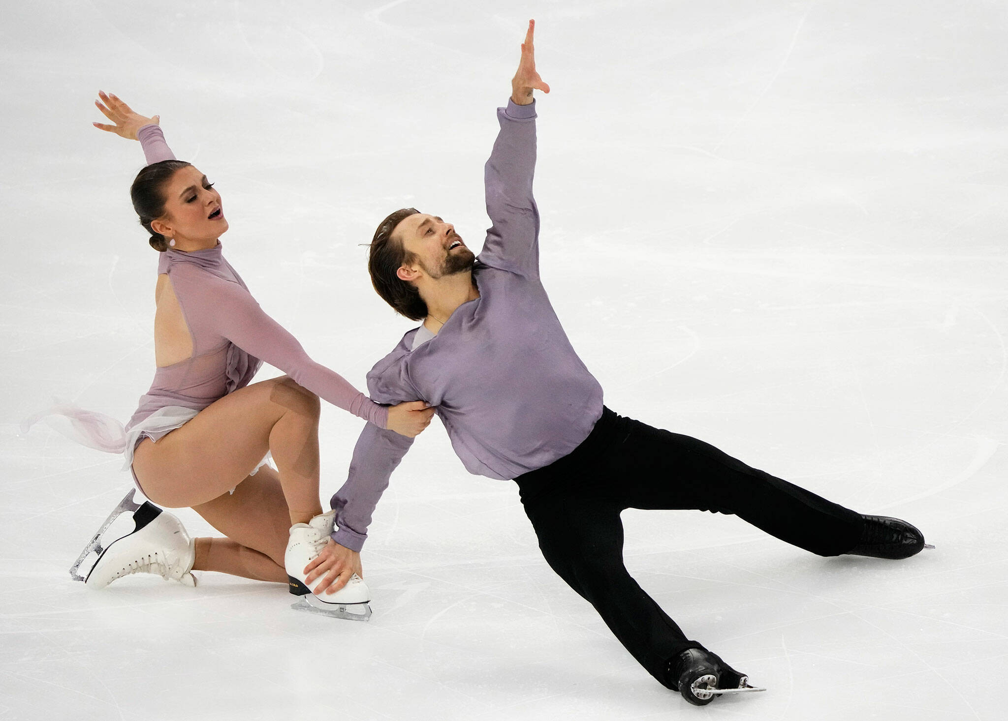 Edmonds native Jean-Luc Baker (right) and Kaitlin Hawayek of the United States perform in the ice dance free dance skating program during the ISU Grand Prix of Figure Skating Rostelecom Cup on Nov. 27, 2021, in Sochi, Russia. (AP Photo/Alexander Zemlianichenko)