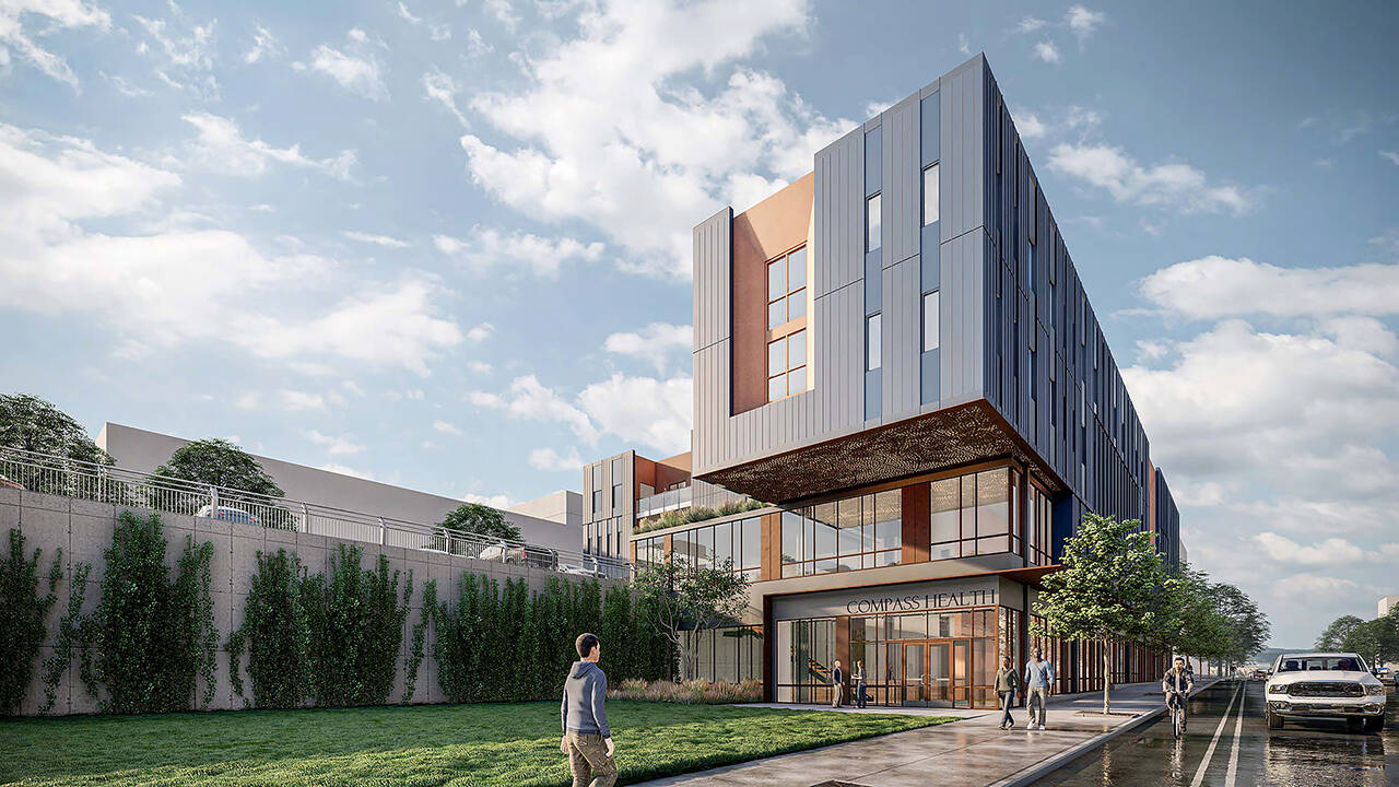 Looking northwest, a rendering of the proposed Compass Health Broadway Campus Redevelopment’s next phase, an 82,000 square feet building with a behavioral health clinic with a 16-bed inpatient center and a 16-bed crisis triage center. (Ankrom Moisan Architects)