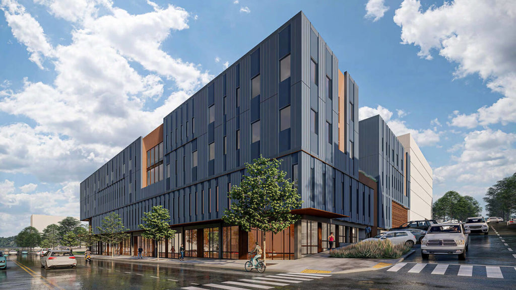 A rendering of the Compass Health Broadway Campus Redevelopment looks southwest at the building. The facility is planned for 82,000 square feet with a behavioral health clinic with a 16-bed inpatient center and a 16-bed crisis triage center. (Ankrom Moisan Architects)
