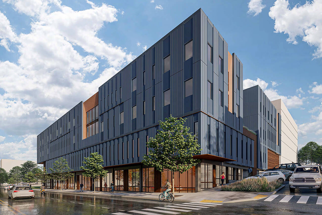 A rendering of the Compass Health Broadway Campus Redevelopment looks southwest at the building. The facility is planned for 82,000 square feet with a behavioral health clinic with a 16-bed inpatient center and a 16-bed crisis triage center. (Ankrom Moisan Architects)