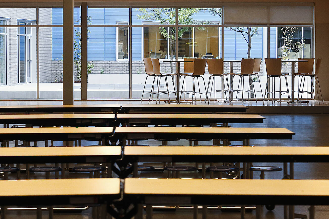 School leaders in districts like Everett and Marysville have warned of a looming transition to online learning. This 2019 photo shows an empty cafeteria at North Middle School. (Dan Bates / Herald file)