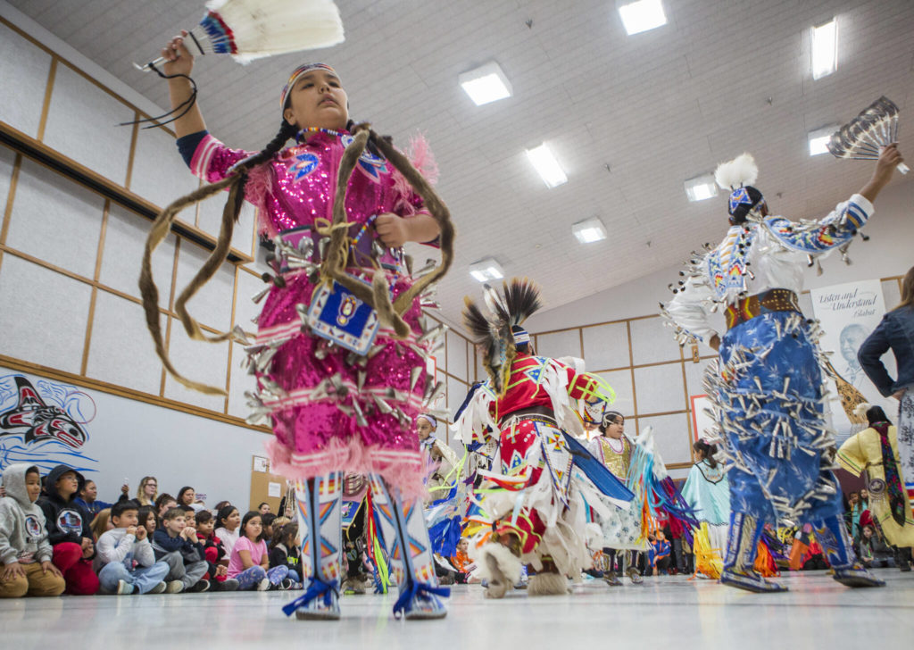 Maleia Kickingwoman dances in a pink jingle dress during Tulalip Day at Quil Ceda Tulalip Elementary on Nov. 27, 2019. (Olivia Vanni / Herald file)
