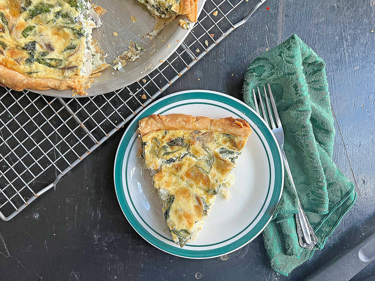 This easy-to-make spinach and mushroom quiche is perfect for a light dinner or fancy brunch. (Gretchen McKay / Pittsburgh Post-Gazette)